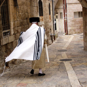 Orthodox Jewish man walks in Mea Shearim on October 20 2005 Jerusalem, Israel.It's one of the oldest Jewish neighborhoods in Jerusalem populated mainly by Haredi Jews.