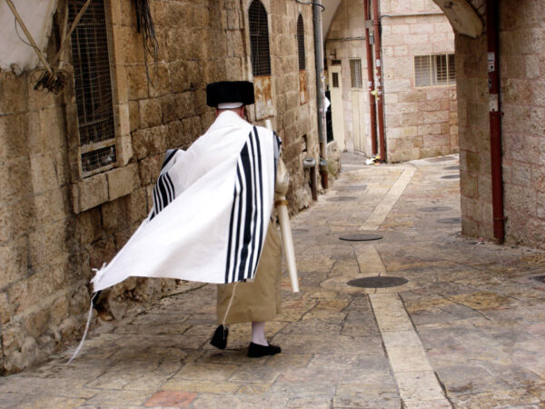 Orthodox Jewish man walks in Mea Shearim on October 20 2005 Jerusalem, Israel.It's one of the oldest Jewish neighborhoods in Jerusalem populated mainly by Haredi Jews.