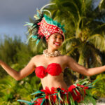 Happy young adult sexy Polynesian Pacific Island Tahitian female dancer