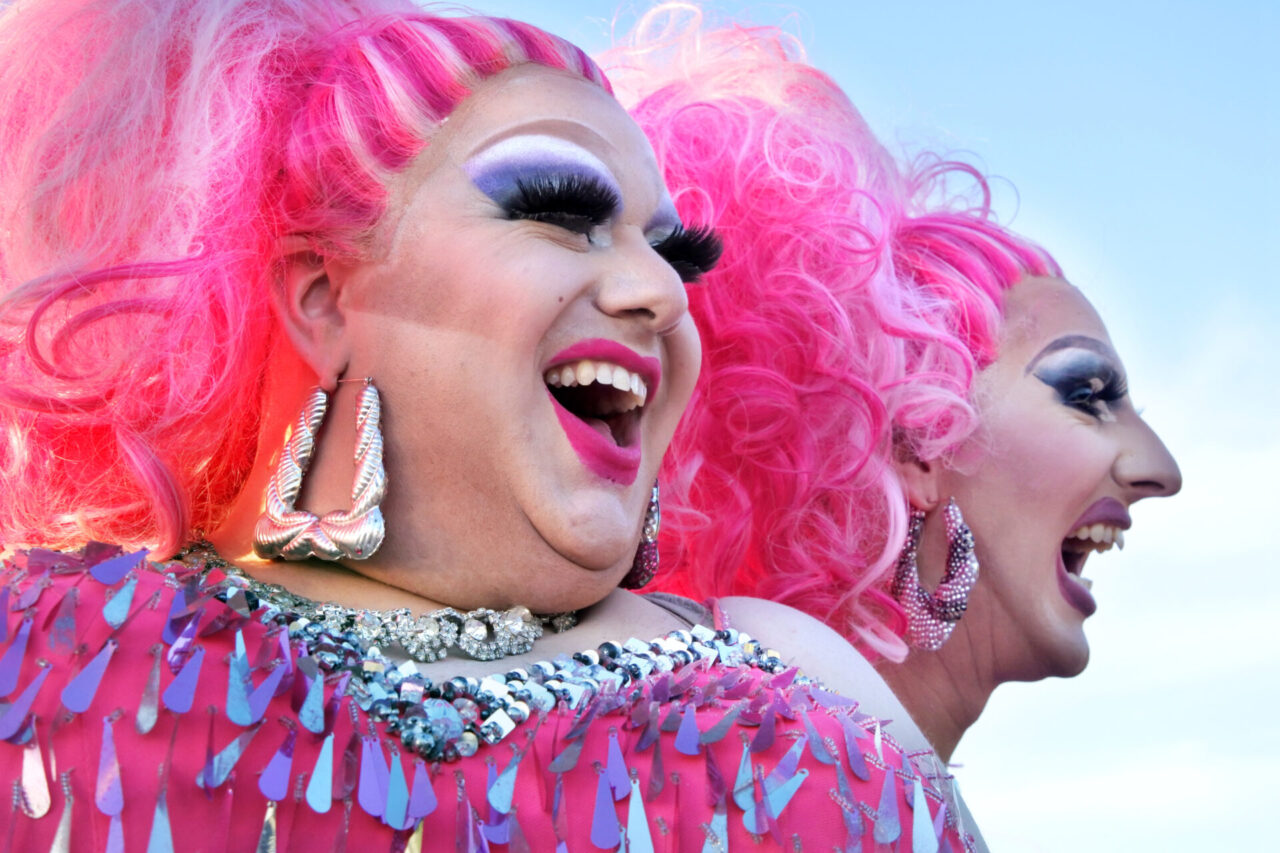 Happy Drag queens laughing