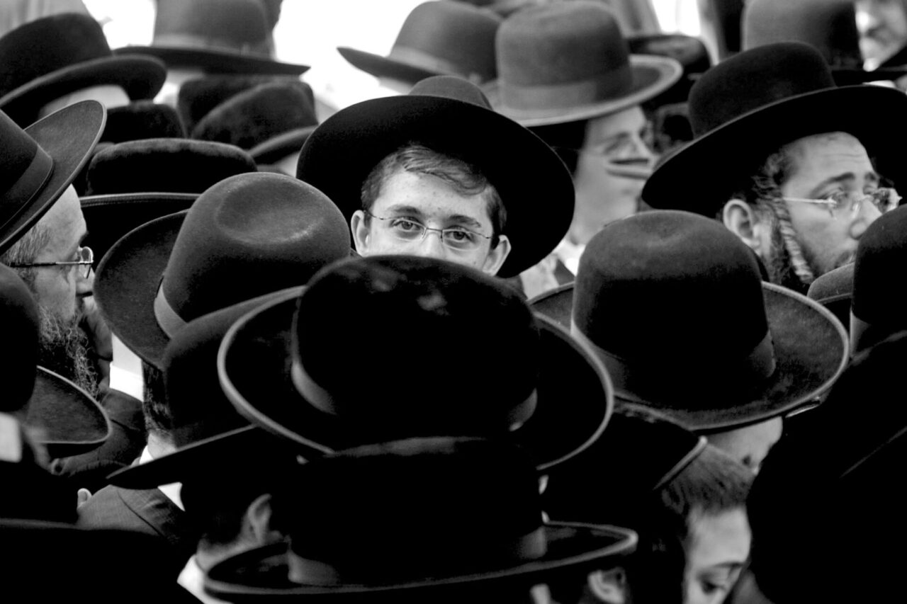 Orthodox Jewish Man Stand Out From the Crowd