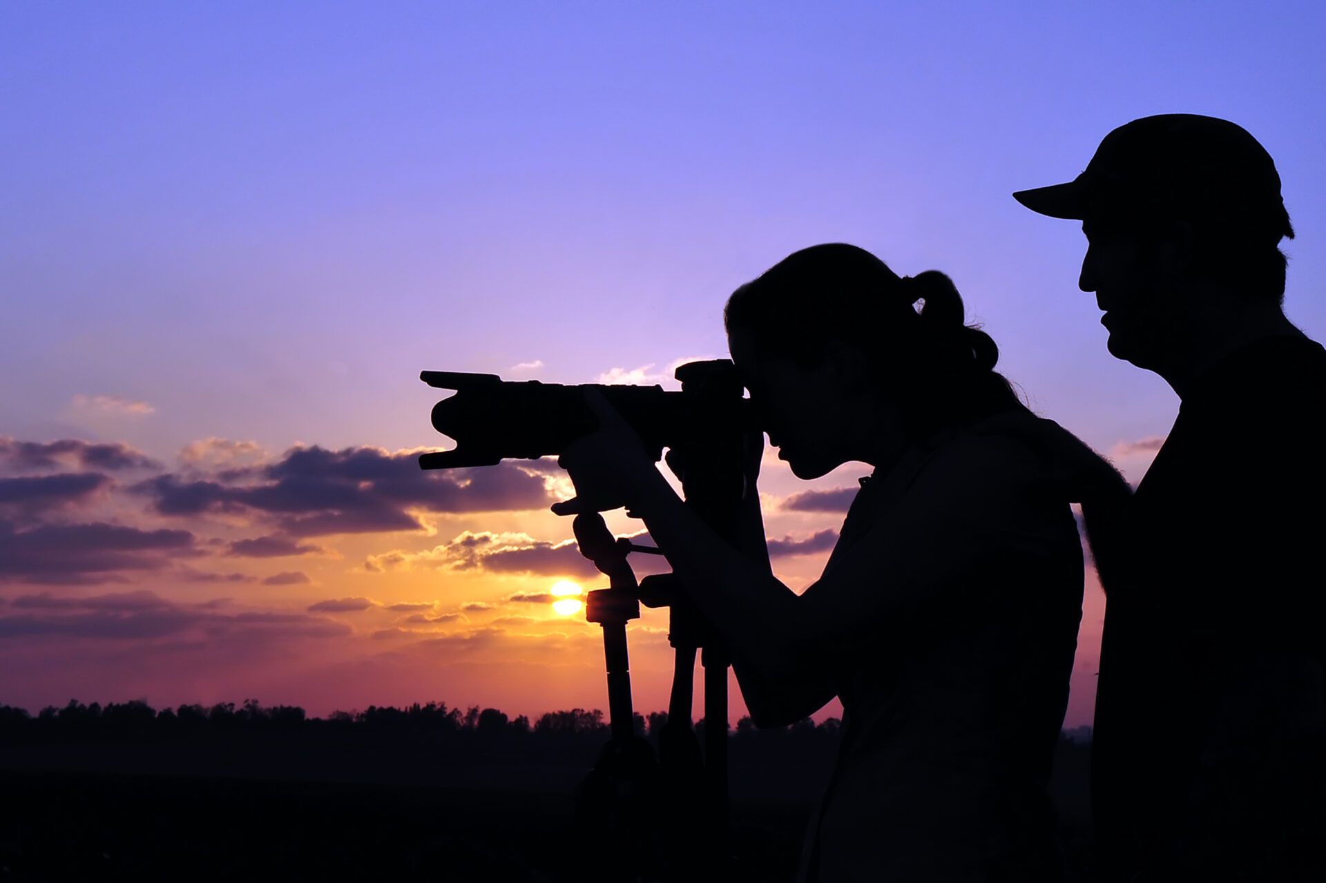 Silhouette of professional documentary travel photographer teaching