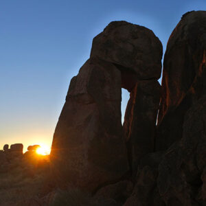 Silhouette landscape view of Devils Marbles Karlu Karlu at sunset sky light in the Northern Territory, Australia.