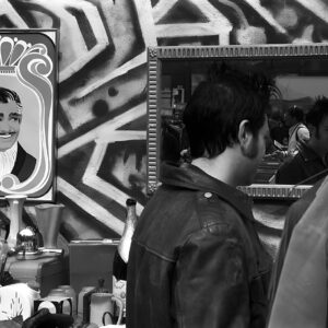 Looking Good Clark Gable looking at punk reflection in mirror – Fine art photography print for sale. Decoration poster for home or office wall taken by documentary travel photographer Rafael Ben Ari