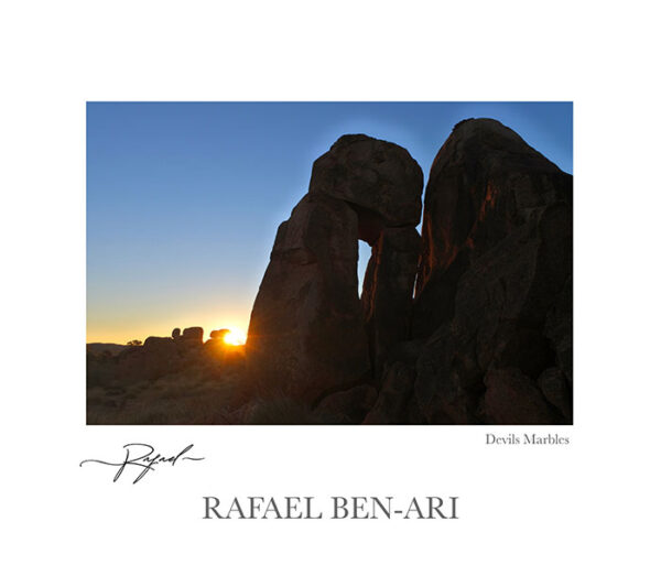 Silhouette landscape view of Devils Marbles Karlu Karlu at sunset sky light in the Northern Territory, Australia.