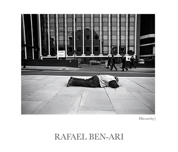 Hierarchy the British working lower class lying down flat on the ground when the upper class businessmen passing by – Fine art photography print for sale. Decoration poster for home or office wall taken by documentary travel photographer Rafael Ben Ari