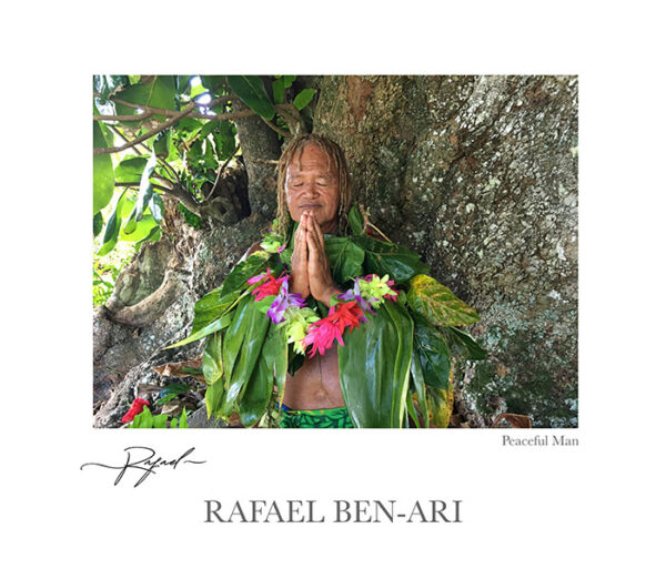 Peaceful Man – Pacific Islander praying for the environment under a rain forest tree in Rarotonga, Cook Islands – Fine art photography print for sale. Decoration poster for home or office wall taken by documentary travel photographer Rafael Ben Ari