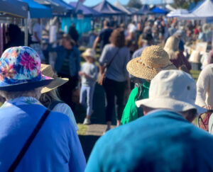 Crowd of people shopping in local market