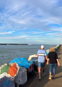 PORT MACQUAIRE, NSW - AUG 24 2025:Australian people walking on Port Macquarie Coastal Walk in New South Wales, Australia, known for its beautiful beaches and scenic hiking trails.