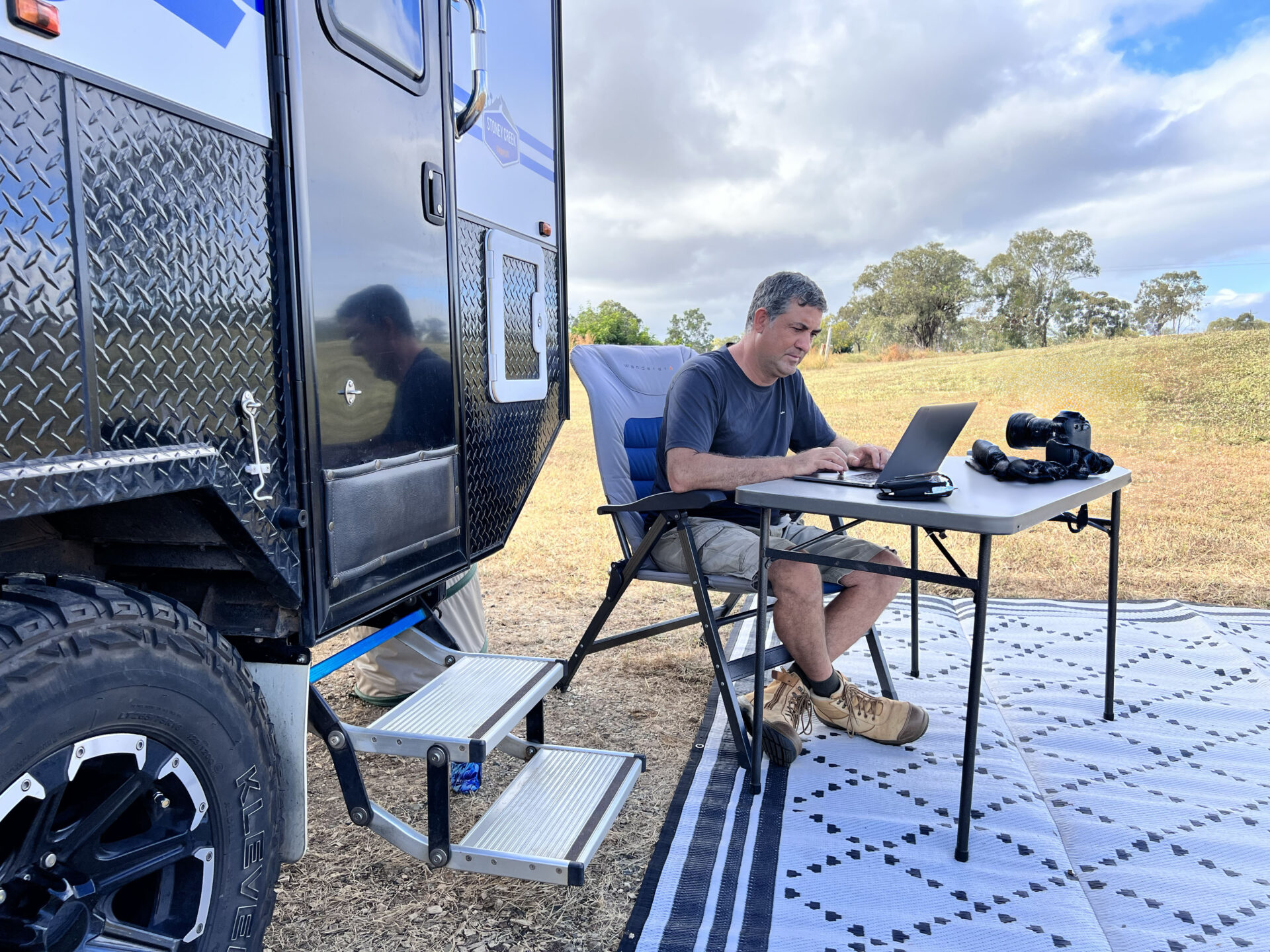 Documentary travel photographer Rafael Ben-Ari is post-processing photos and videos in the Queensland outback, Australia.